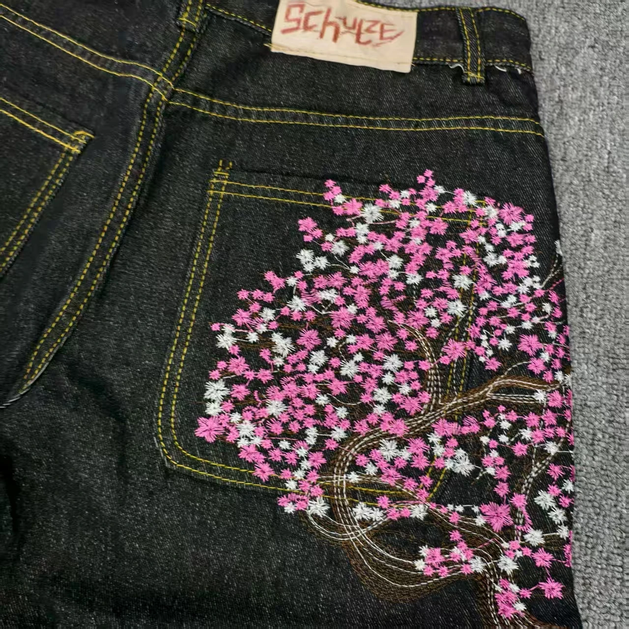 Sakura Pocket Embroidery Fashi - مراجعة Embroidery Jeans Sakura وسعره